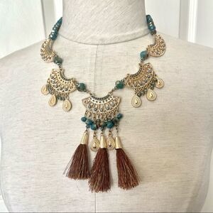 Cato 1946 Gold tone blue beaded tassel statement necklace